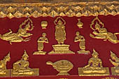 Wat Xieng Thong temple in Luang Prabang, Laos. the Ho Tai, the library. Decoration of the pediment.